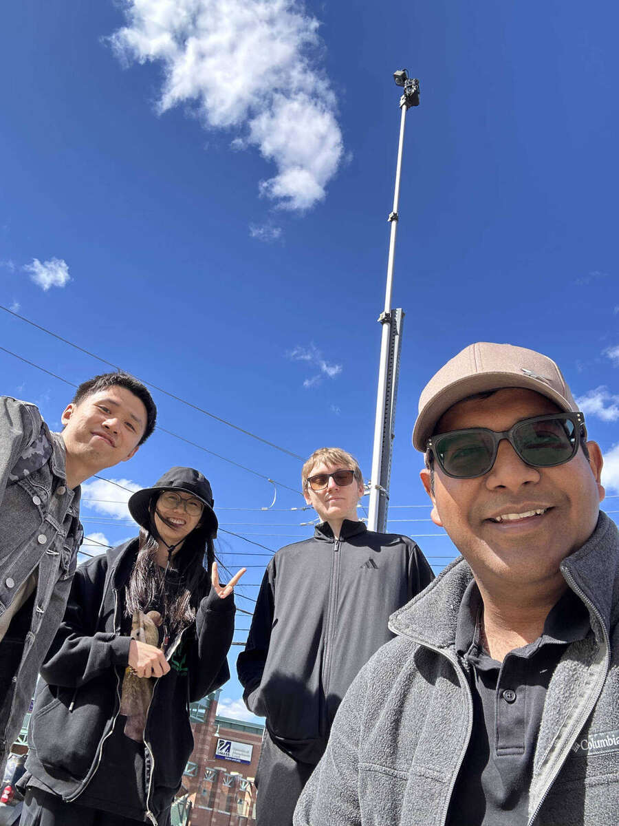 ITS Group installing an all-weather camera for pedestrian safety and turning movement count research